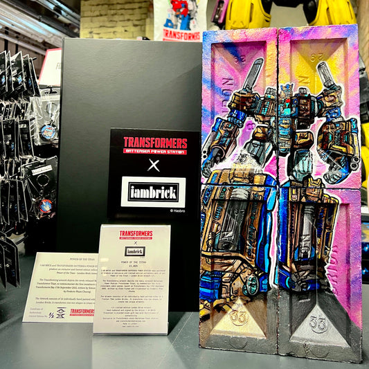 Transformers artwork Titan figure packaging with brand logos in a store setting